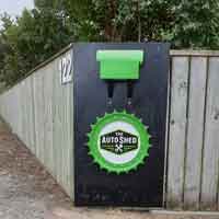 Look for the big green cog